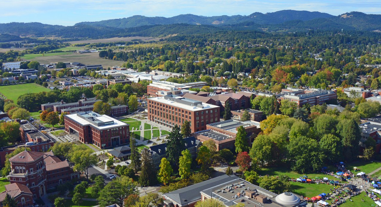 Aerial view of the Oregon State University campus in Corvallis, with the Coast Range in the background